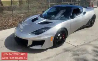Lotus Elise Sports Car at JFM Motorcars Silver Lotus Elise parked on concrete driveway